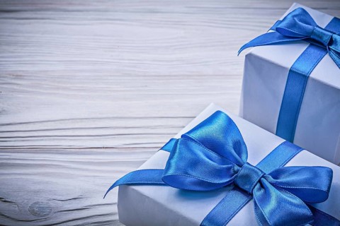 Set of present boxes on wooden board celebrations concept
