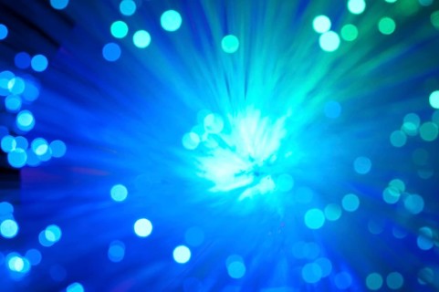 Optical fibers of fiber optic cable. Internet technology.Blue color