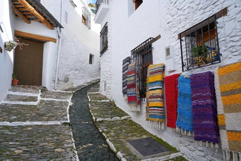 Alpujarras street rugs in Pampaneira of Granada colorful serape