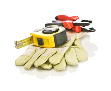 Pliers and tapeline on gloves