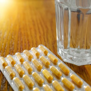 An image of some yellow pills in a blister pack