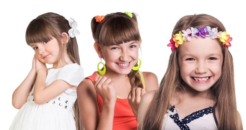 Group of little happy girls isolated in white background