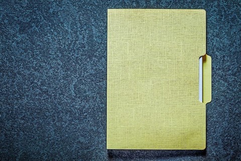 Office folder on black background