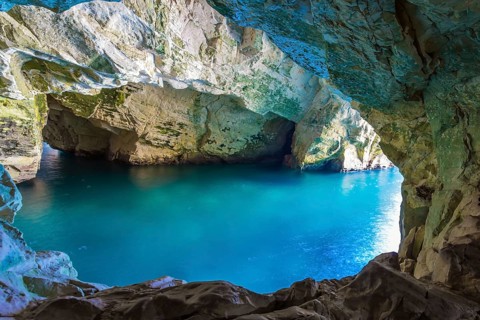 Karst cave Rosh-a-Nikra on the shores of the Mediterranean Sea. Israel. The color of sea water
