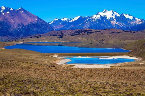 Los Glaciares is Argentina's most beautiful natural park. Pampas surround snow-capped mountains.
