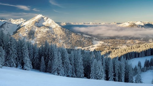 Winter hiking and skiing in the tannheimer valley with fresh snow. Near Oberjoch Pirschling