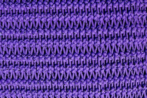 Fishing trawler boat net purple texture with rope knots