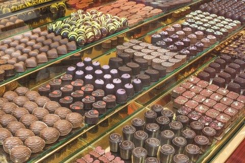 Chocolate candy in a store window. Stand with chocolates. Bulgaria