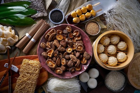 Shiitake rice dumplings steamed pork buns noodles Asian cuisine food mix