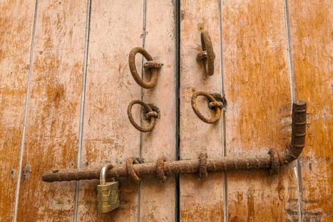 Close-up of traditonal door lock on wooden door in Cartagena, Colombia, South America