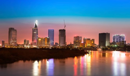 Saigon skyline with river after sunset, Vietnam, Asia
