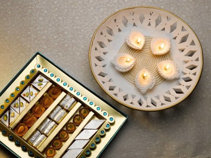 New style oil lamps decoration and sweets box during diwali festival, India, Asia