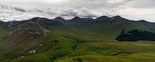 Panorama landscape view of the Twelve Bens mountains in Connemara National Park in County Galway of