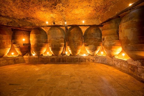 Antique winery in Spain with clay vessels terracotta amphora pots Mediterranean tradition with