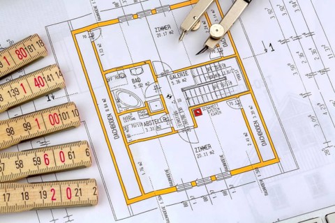 Building plan for a house. With compass and scale Austria