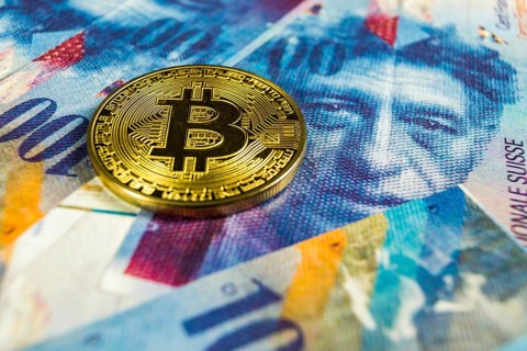 Photo of Crypto currency concept, A Bitcoin with Swiss franc currency, Switzerland, Europe