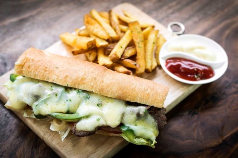 Gourmet Philly Cheese steak american Sandwich with fries