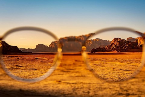 View at the Wadi Rum desert in Jordan through glasses during a nice sunset with clear sky. Travel,