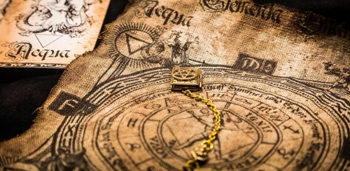 Ancient esoteric witchcraft background. Occultims and paganism old symbol, with mysterious runes