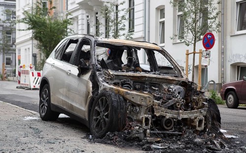 Burnt-out car after another G20 arson attack in 2018
