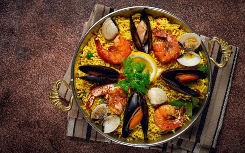 Paella, traditional Spanish dish, seafood paella, top view, homemade, no people