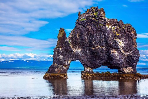 Northwest Iceland. Hvitserkur - basalt rock in the form of a huge scary monster. The concept of