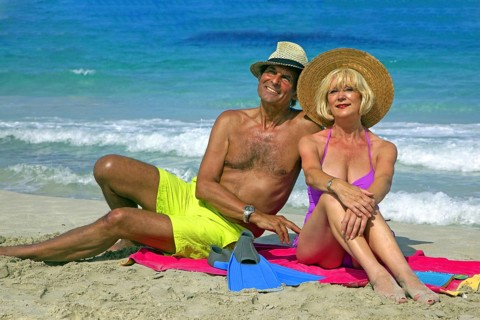 Seniors, couple on the beach in Ibiza
