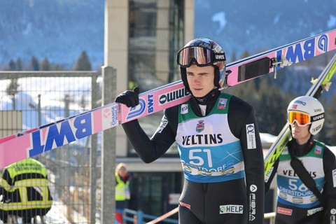 Marius Lindvik (Norway/NOR) on his way to the ski jump during the qualification for the opening ski