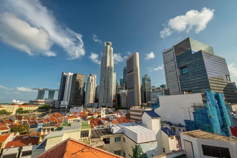 Singapore high angle view sunrise city skyline at Boat Quay and Clarke Quay waterfront business