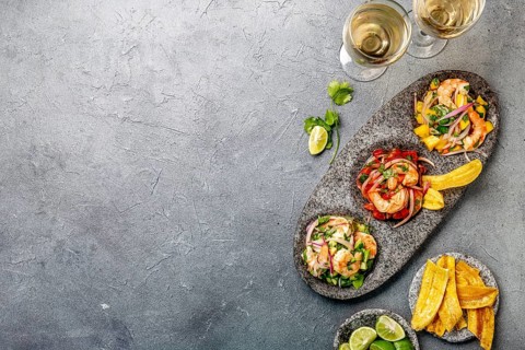 Food, Coloresd ceviches with mango, avocado and tomatoes. White wine, lime and banana chips