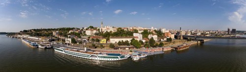 Aerial panorama Belgrade cityscape from Sava river in Serbia at summer evening