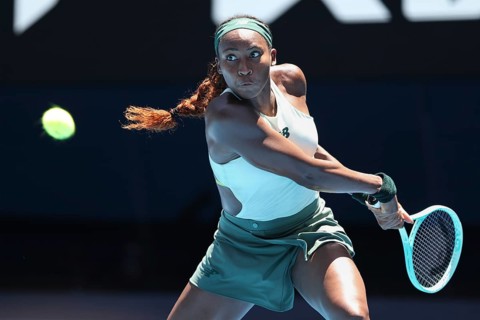 American tennis player Coco Gauff (USA) playing a backhand shot at the Australian Open 2025