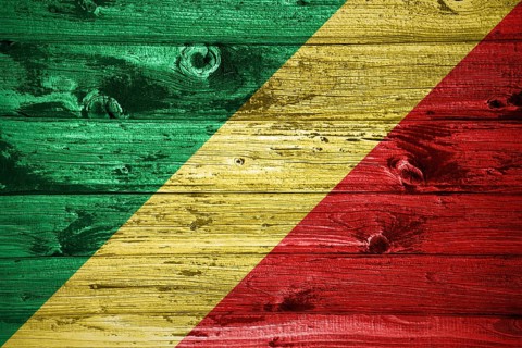 Republic of the Congo flag on wooden planks background wood flag