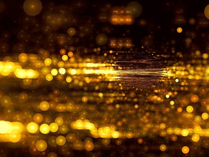 Golden fractal backdrop - blurred surface with bubbles bokeh and light effects. Abstract