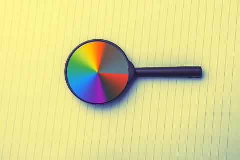 Looking through a magnifying glass to documents. Concept of search