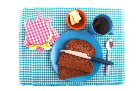 Breakfast with healthy brown bread butter and preserved jam