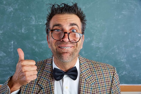 Nerd silly retro teacher man with braces funny expression ok thumb up gesture