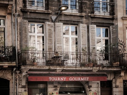 Residential flats sit above a restaurant in a multi use building in Bordeaux, France, Europe
