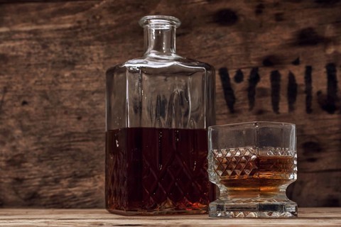 Seasoned brandy into the glasses and decanter vintage style