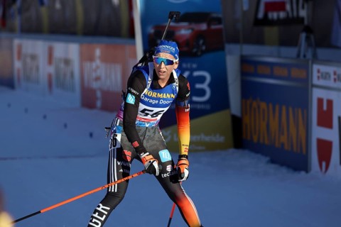 Franziska Preuß (SC Haag) crossing the finish line in the pursuit at the IBU Biathlon World