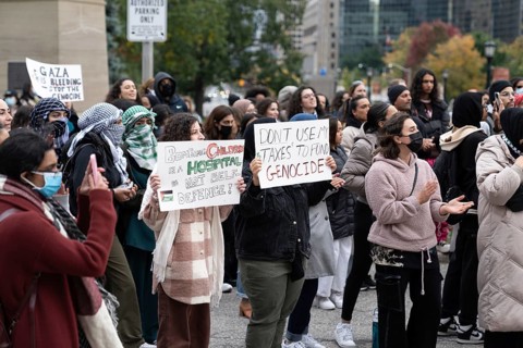 Toronto, Canada - 18 October 2023: The power of unity: individuals coming together for a shared