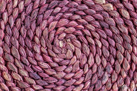 Braided raffia coaster as a background