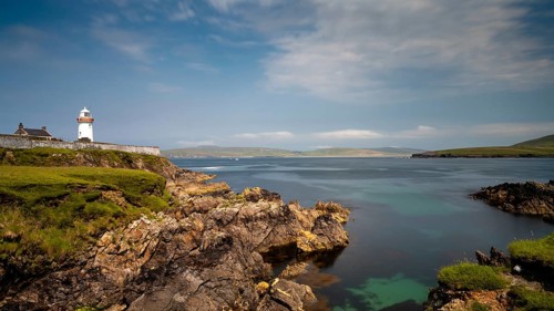 A view of the historic Broadhaven Lighthouse on the Mullet Peninsula in County Mayo in Ireland