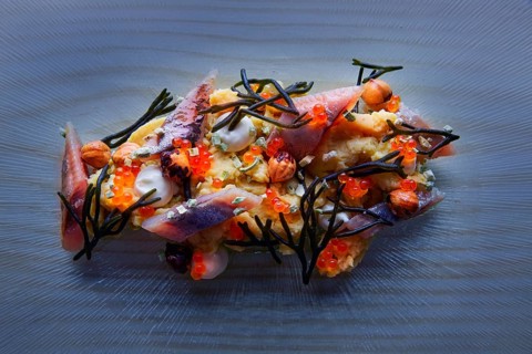 Smoked sardines salad with creamy cheese corn codium and hazelnuts