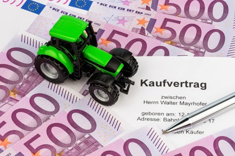 The purchase contract for a new tractor. With euro money and biros