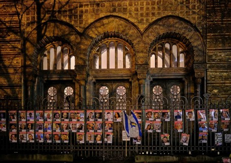 Germany, Berlin, 19 December 2024, Photos of Hamas hostages, fence in front of the New Synagogue,