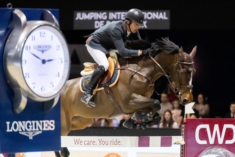 Harrie Smolders of the Netherlands competes in the equestrian Audi Grand Prix at Jumping