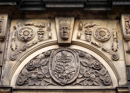 Sowerby bridge, west yorkshire, united kingdom, 16 july 2019: carved heraldic logo over the former