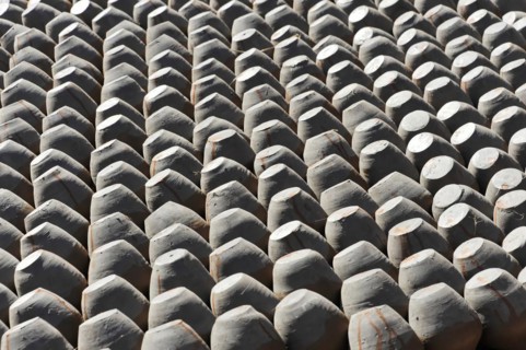 Ordered stacks of clay pots create a repeating geometric pattern, Kathmandu Valley. Kathmandu,