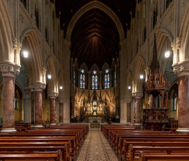 Cobh, Ireland, 15 August, 2022: view of the central nave and altar with the elegant wooden pulpit
